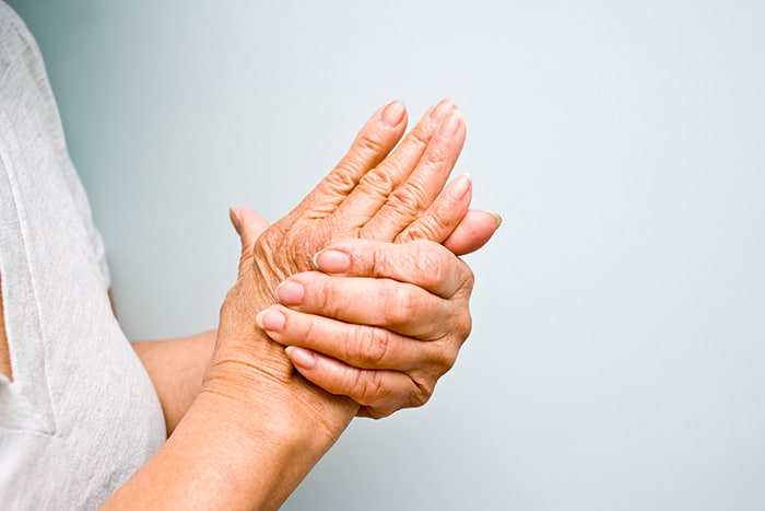 1760654173 hand joint pain 1 How Fall Weather Affects Your Joints